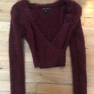 Fuzzy burgundy wrap sweater from fashion nova